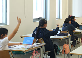 Student working in class